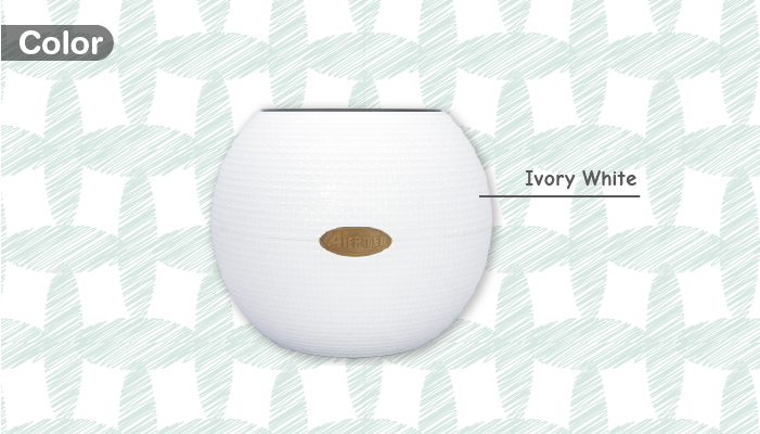 Taiwan made ivory white planter combines self watering function with elegant appearance.